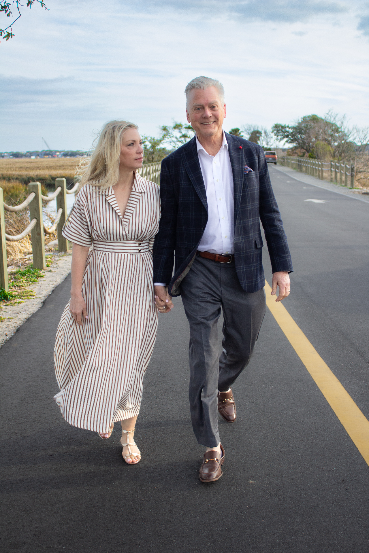 Woody and Debi Sprouse walking near the Lowcountry marsh